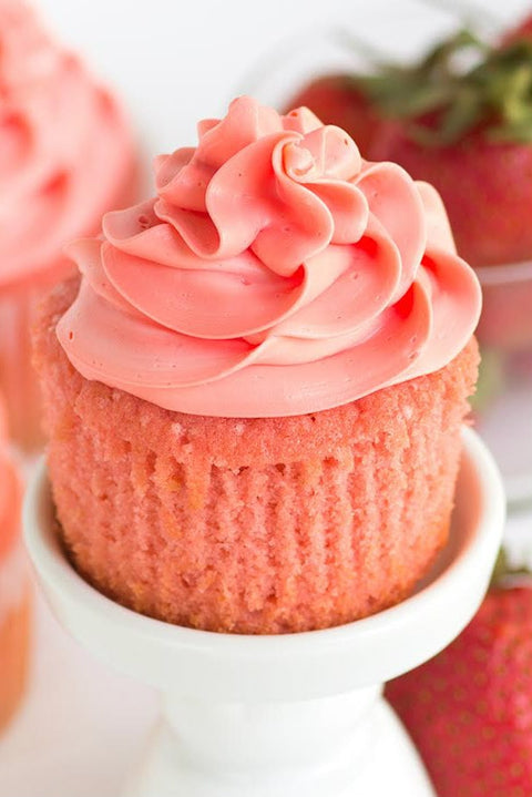 Strawberry Cupcake on white pedestal